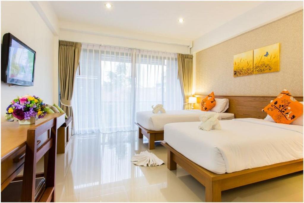 Двухместный (Стандартный двухместный номер с 2 отдельными кроватями) отеля Palmari Boutique Hotel, Краби