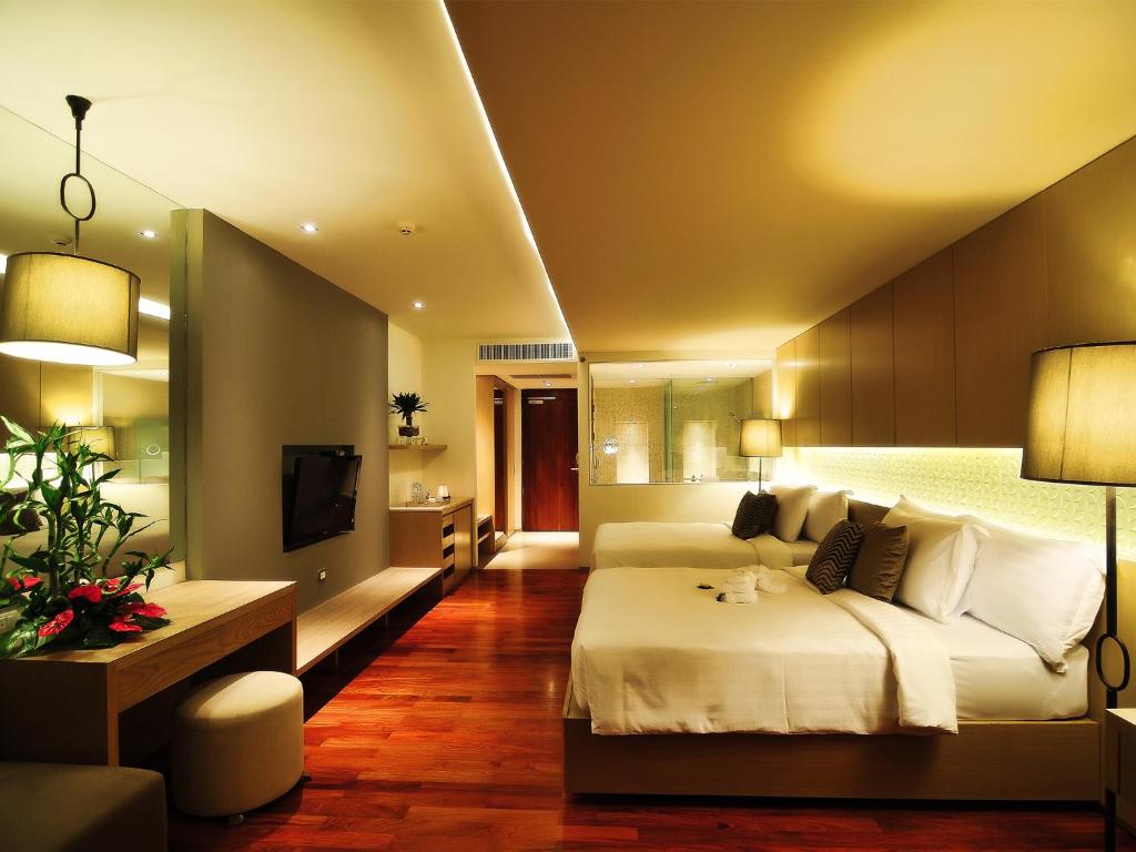 Двухместный (Номер Делюкс Sunset, вид на бассейн) курортного отеля Phuket Graceland Resort and Spa, Пхукет
