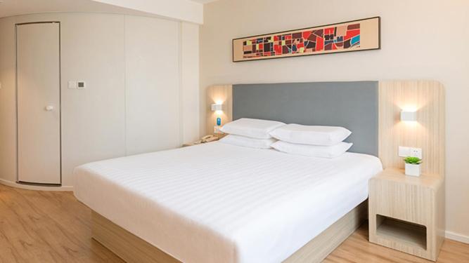 Двухместный (Улучшенный двухместный номер с 1 кроватью) отеля Hanting Hotel Wuxi Singapore Industrial Park, Уси