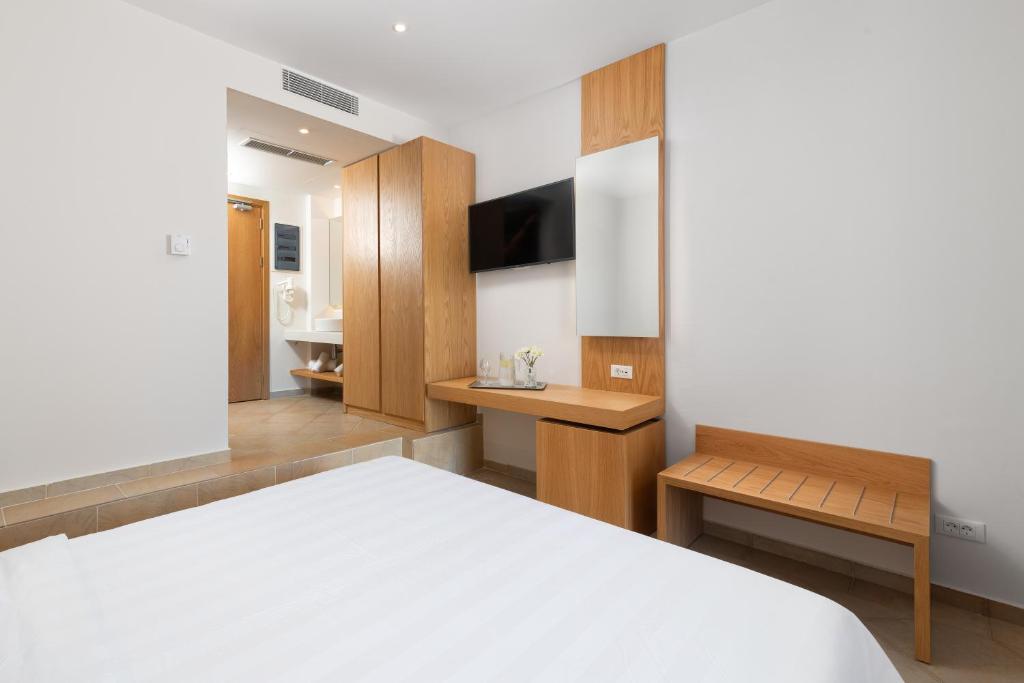 Двухместный (Двухместный номер Делюкс с 1 кроватью или 2 отдельными кроватями и видом на море) отеля Lindos Royal Hotel, Линдос