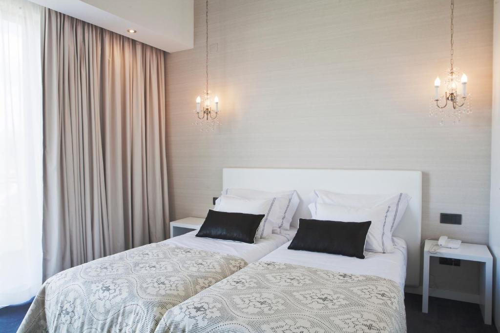 Двухместный (Двухместный номер с 2 отдельными кроватями) отеля Real Abadia, Congress & Spa Hotel, Алкобаса