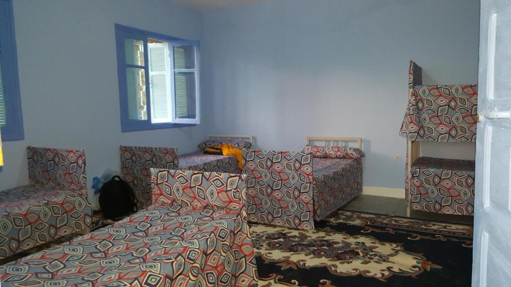 Номер (Односпальная кровать в общем номере для мужчин и женщин) хостела Chaouen Youth Hostel, Шефшауэн