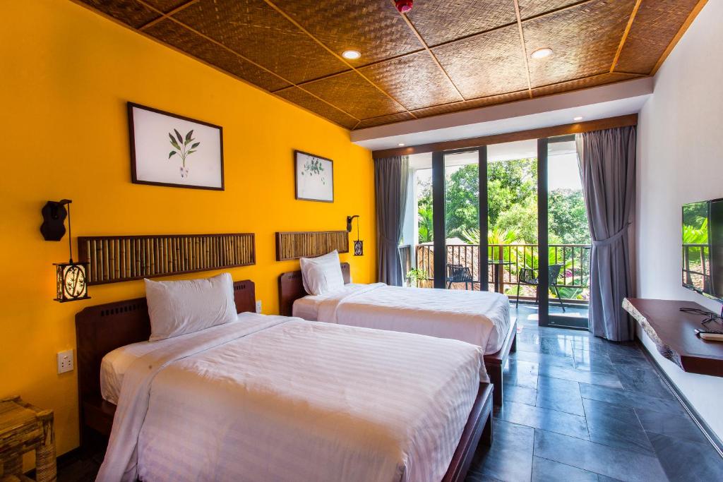 Двухместный (Двухместный номер с 2 отдельными кроватями и окном) апарт-отеля The Shoreline Stay, Хойан