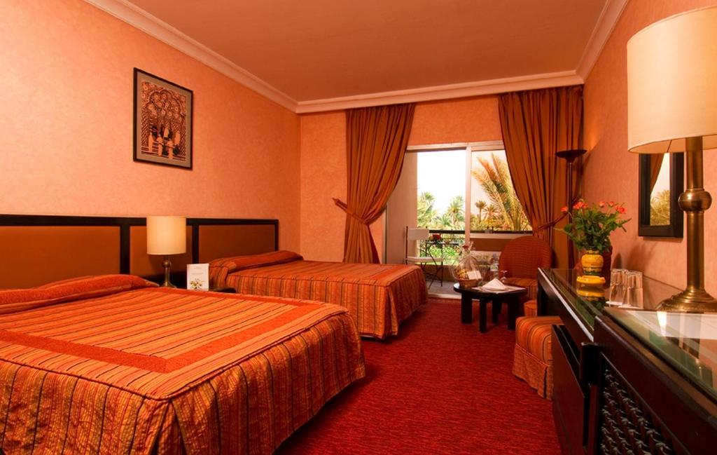 Трехместный (Трехместный номер) отеля Hôtel Marrakech Le Semiramis, Марракеш