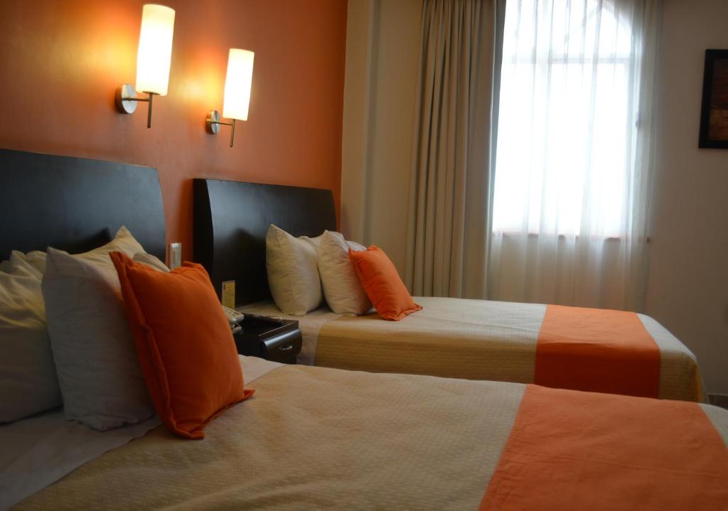Двухместный (Двухместный номер Делюкс с 1 кроватью) отеля Hotel Baez Paraiso, Параисо
