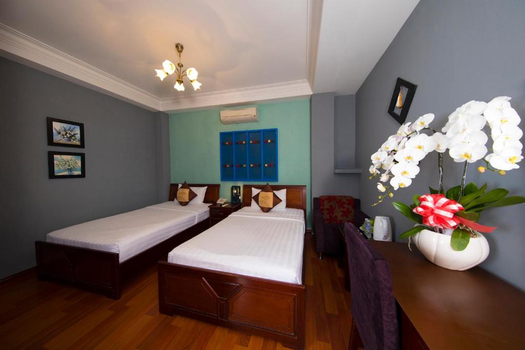 Двухместный (Стандартный двухместный номер с 2 отдельными кроватями) отеля Shangri La saigon hotel, Хошимин
