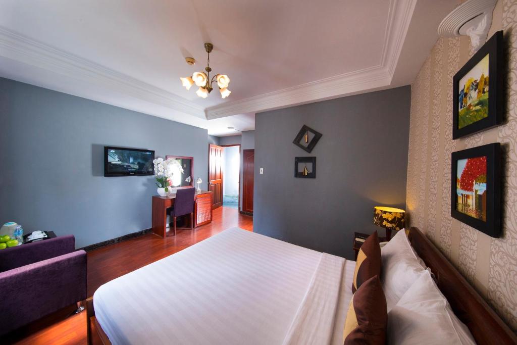 Двухместный (Улучшенный двухместный номер с 1 кроватью) отеля Shangri La saigon hotel, Хошимин