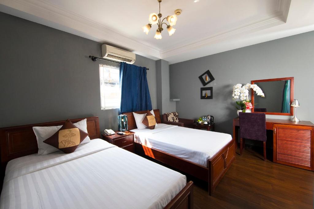 Двухместный (Улучшенный двухместный номер с 2 отдельными кроватями) отеля Shangri La saigon hotel, Хошимин