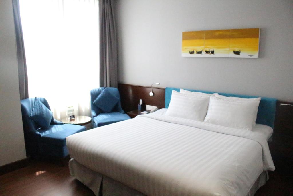 Двухместный (Двухместный номер с 1 кроватью или 2 отдельными кроватями) отеля Central Palace Hotel, Хошимин