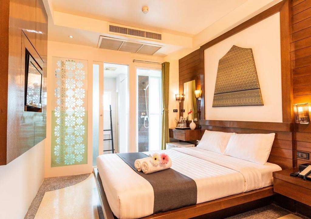 Двухместный (Улучшенный двухместный номер с 1 кроватью) отеля D&D Inn, Бангкок