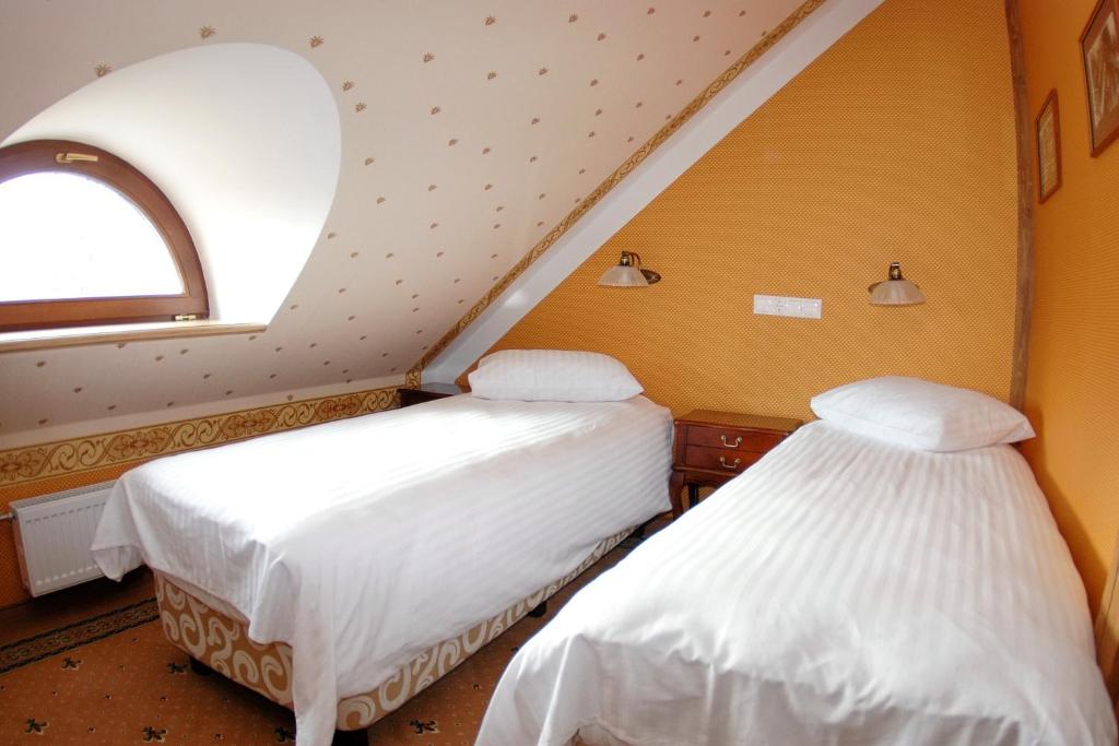 Двухместный (Двухместный номер с 2 отдельными кроватями) отеля Vecgulbenes muiža, Алуксне
