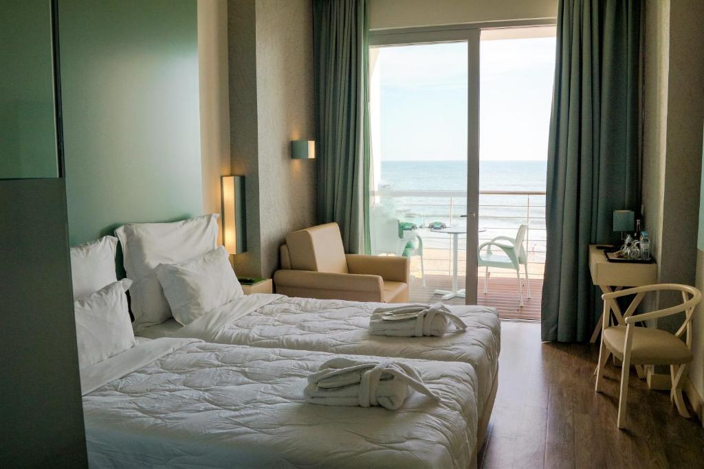 Двухместный (Улучшенный двухместный номер с 1 кроватью и видом на море) отеля INATEL Albufeira, Албуфейра