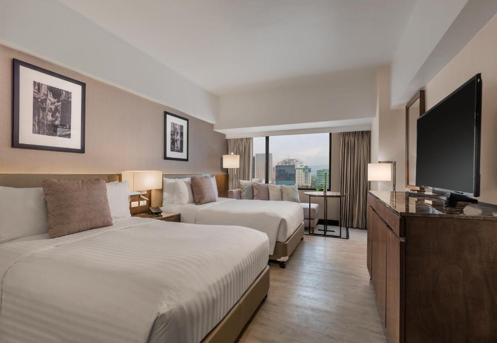 Двухместный (Deluxe Double or Twin Room - Leisure Stay) отеля Seda Ayala Center Cebu, Себу
