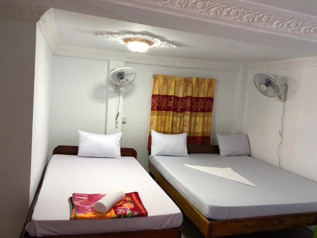 Двухместный (Двухместный номер с 2 отдельными кроватями и вентилятором) гостевого дома Elephant Guesthouse, Кох Ронг