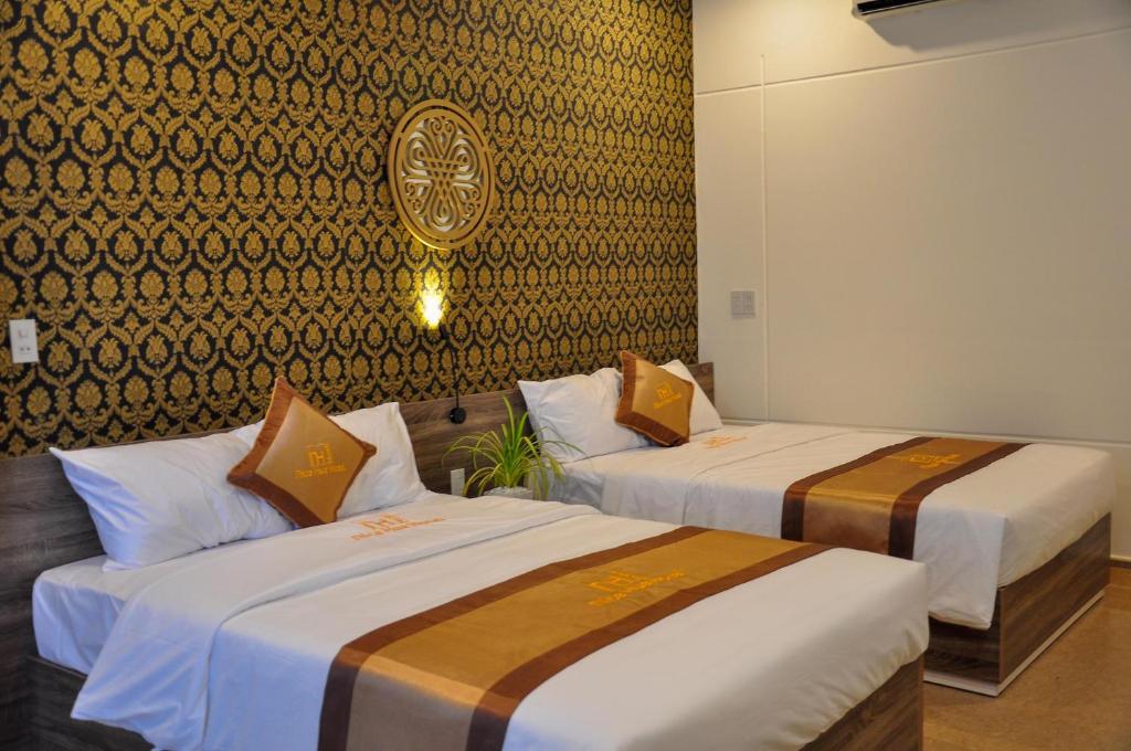 Двухместный (Улучшенный двухместный номер с 1 кроватью или 2 отдельными кроватями) отеля Nice Hue Hotel, Хюэ