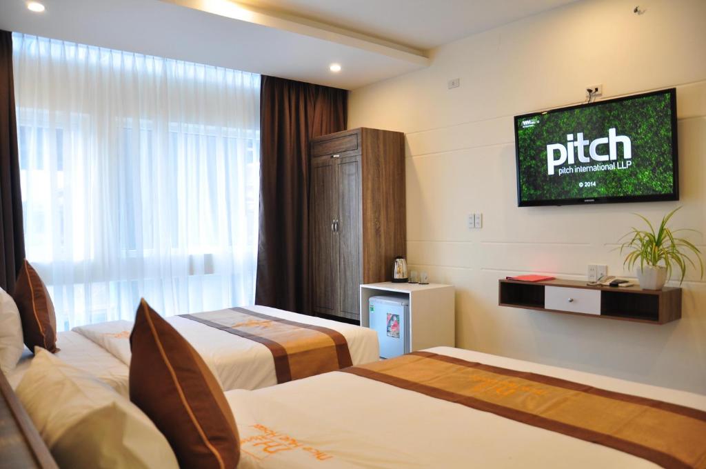 Двухместный (Двухместный номер Делюкс с 1 кроватью или 2 отдельными кроватями, вид на город) отеля Nice Hue Hotel, Хюэ