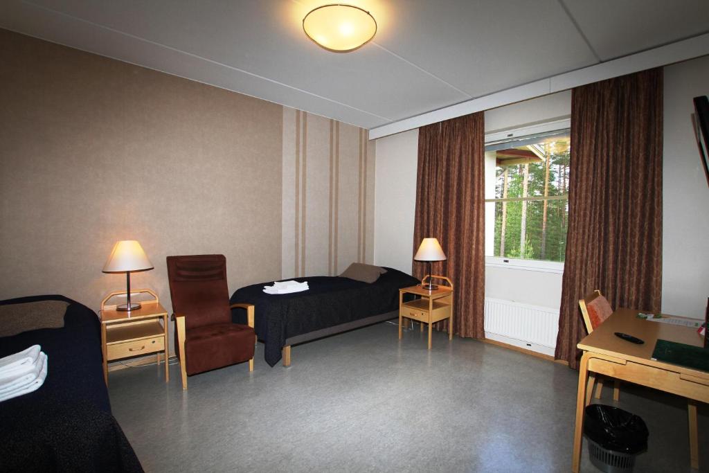 Двухместный (Стандартный двухместный номер с 2 отдельными кроватями) отеля Spa Hotel Kruunupuisto, Пункахарью