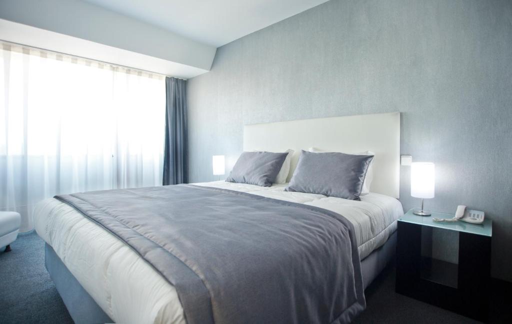 Двухместный (Специальное предложение - Двухместный номер с 1 кроватью/2 отдельными кроватями, пакет услуг «Романтический») отеля Miramar Hotel & Spa, Назаре