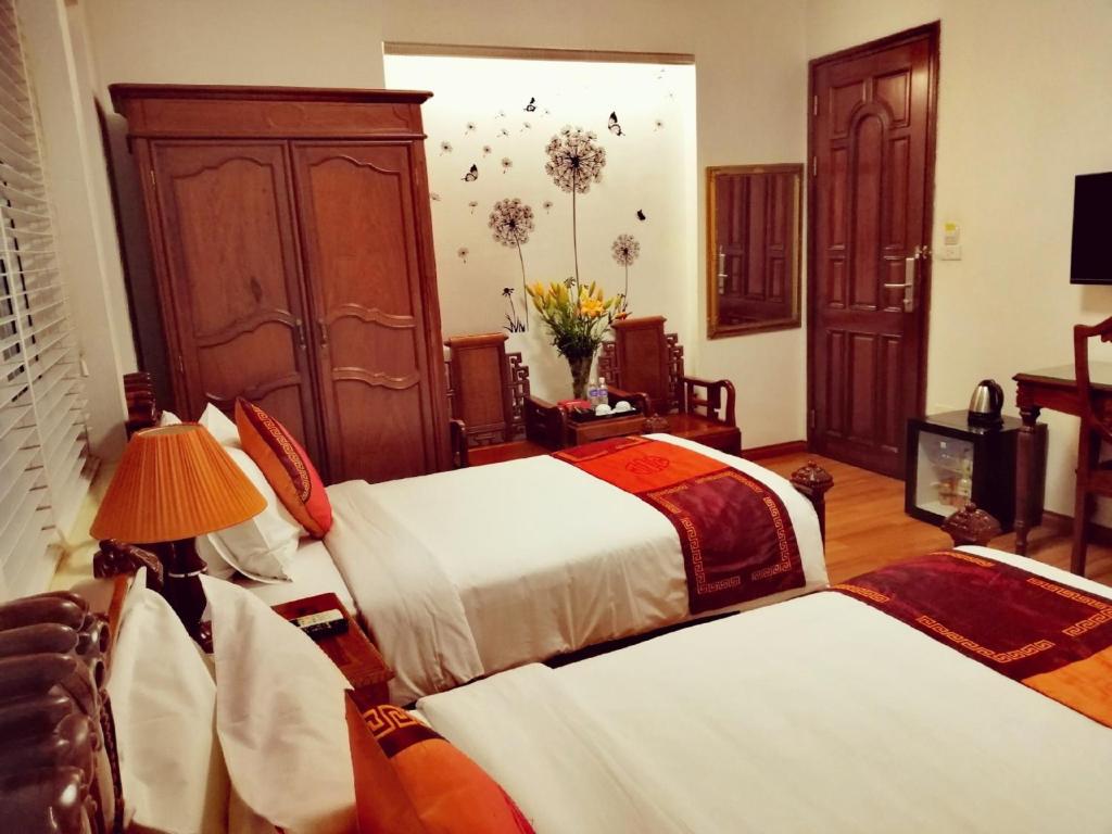 Двухместный (Двухместный номер Делюкс с 2 отдельными кроватями) отеля Phoenix Palace Hotel Hanoi, Ханой