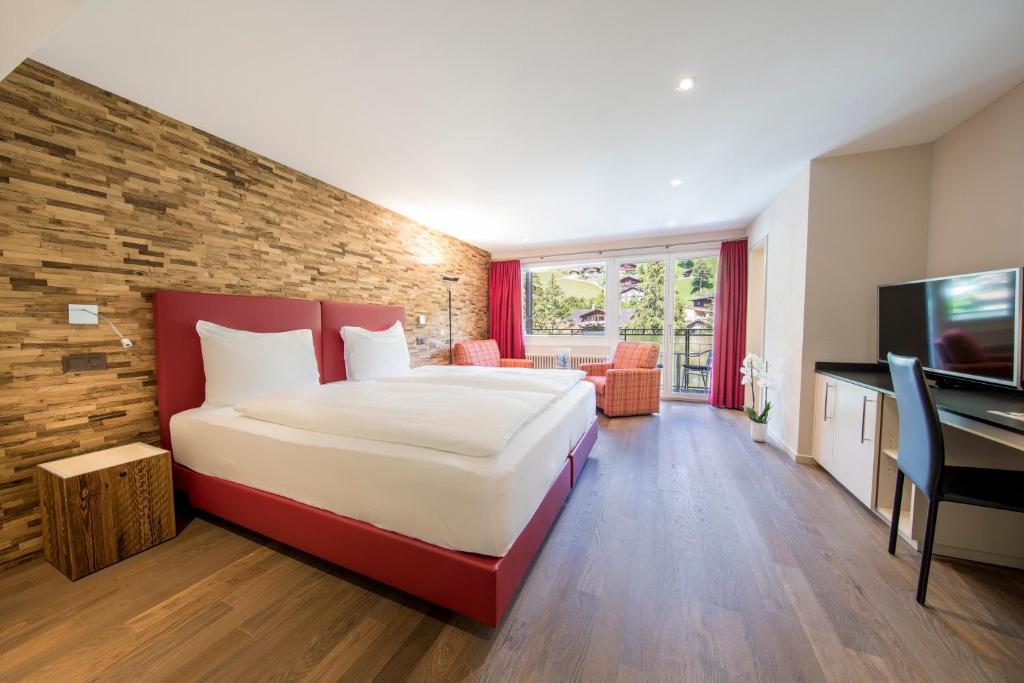 Двухместный (Классический двухместный номер с 1 кроватью или 2 отдельными кроватями и кондиционером) отеля Belvedere Swiss Quality Hotel, Гриндельвальд