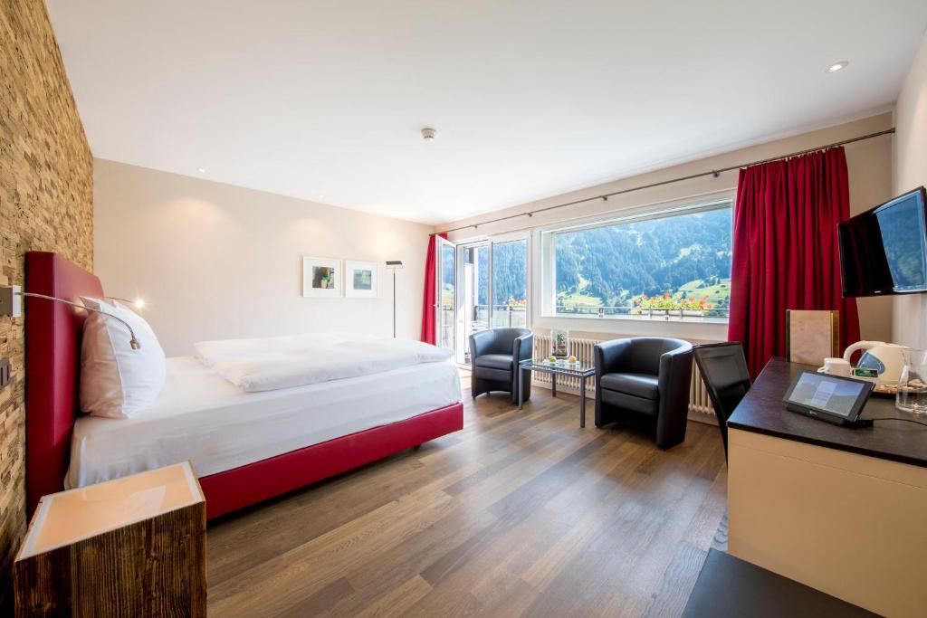 Двухместный (Классический двухместный номер с 1 кроватью или 2 отдельными кроватями и кондиционером — Вид на гору Эйгер) отеля Belvedere Swiss Quality Hotel, Гриндельвальд