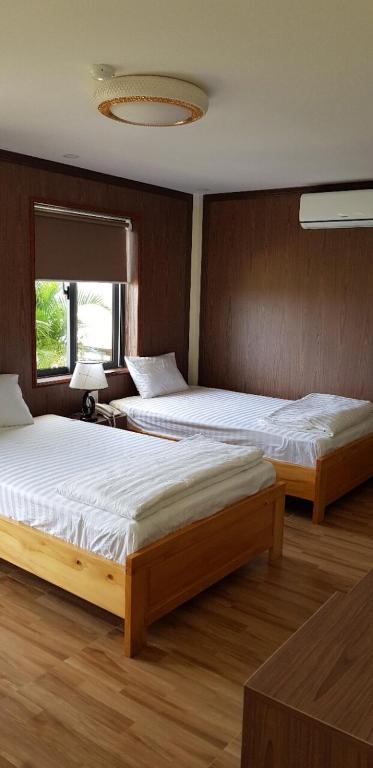Двухместный (Двухместный номер с 2 отдельными кроватями и балконом) отеля HOÀNG SA HOTEL, Камрань