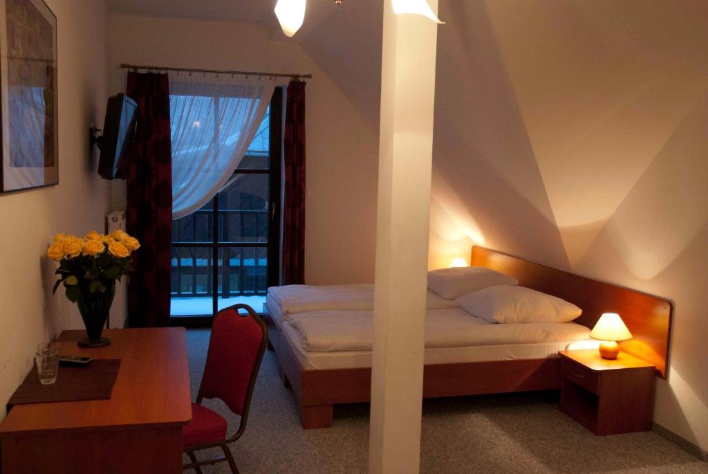 Двухместный (Стандартный двухместный номер с 1 кроватью или 2 отдельными кроватями) апарт-отеля Willa Agnieszka, Казимеж-Дольны