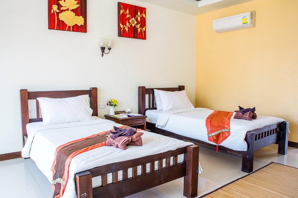 Двухместный (Улучшенный двухместный номер с 2 отдельными кроватями) курортного отеля Ananda Villa, Ко Тао