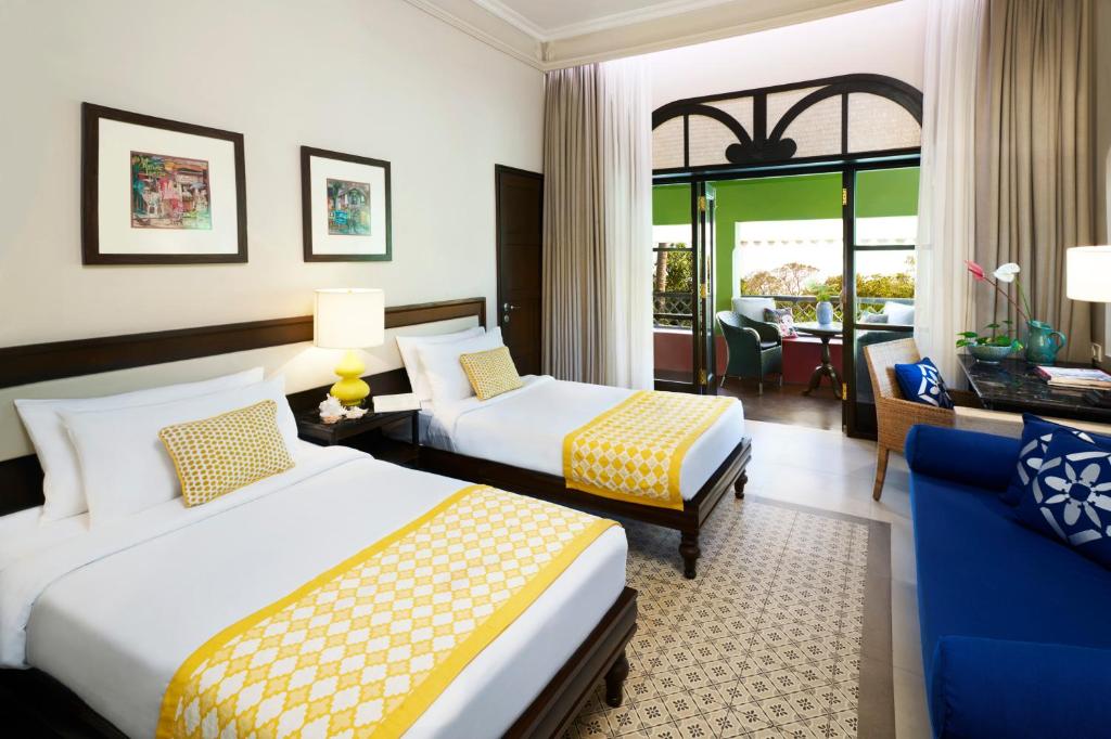 Двухместный (Улучшенный номер с балконом и видом на сад - 2 односпальные кровати) курортного отеля Taj Holiday Village Resort & Spa, Goa, Кандолим