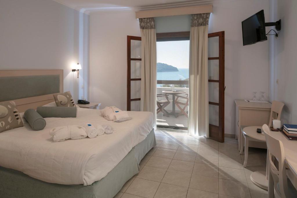 Двухместный (Двухместный номер Делюкс с 2 отдельными кроватями и видом на море) отеля Magic Hotel, Агия-Параскеви, Фессалия и Центральная Греция