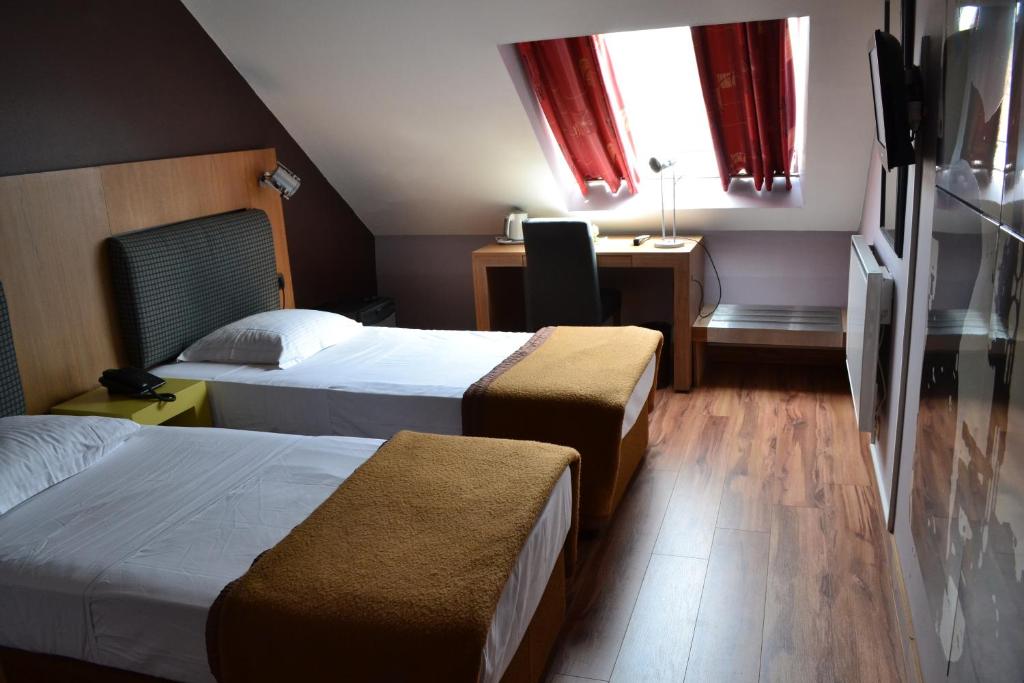 Двухместный (Двухместный номер с 2 отдельными кроватями) отеля Hotel Eurocap, Брюссель