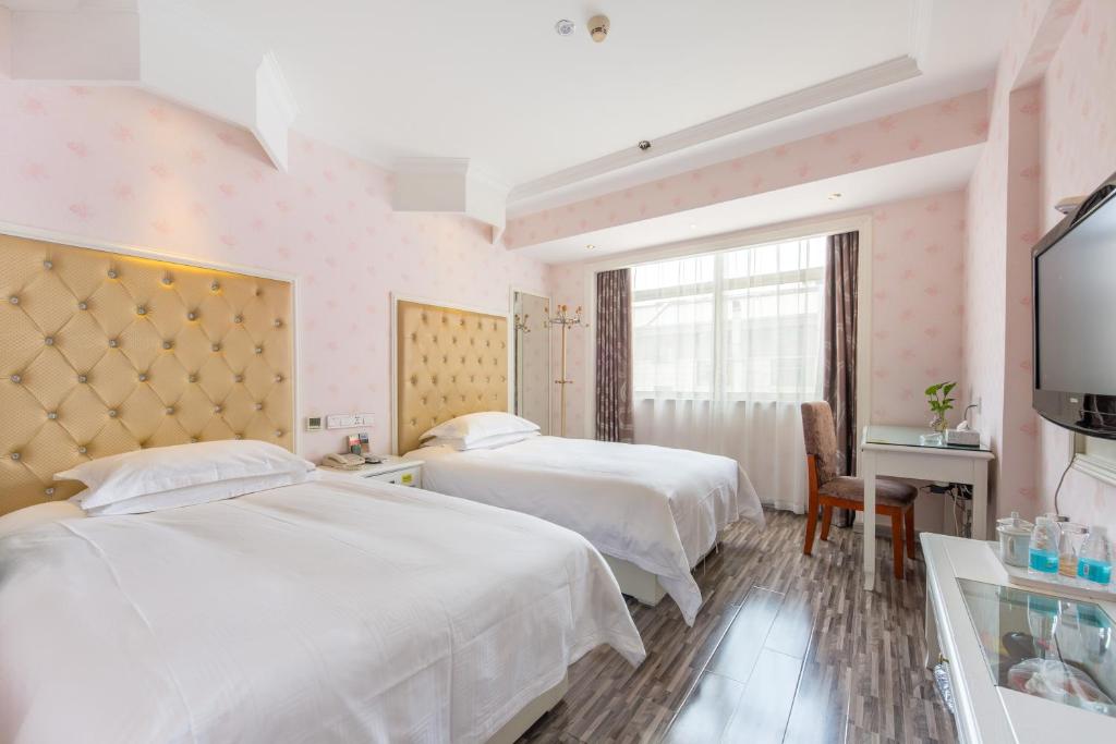 Двухместный (Двухместный номер бизнес-класса с 1 кроватью или 2 отдельными кроватями) отеля Lingshang Hotel, Иу