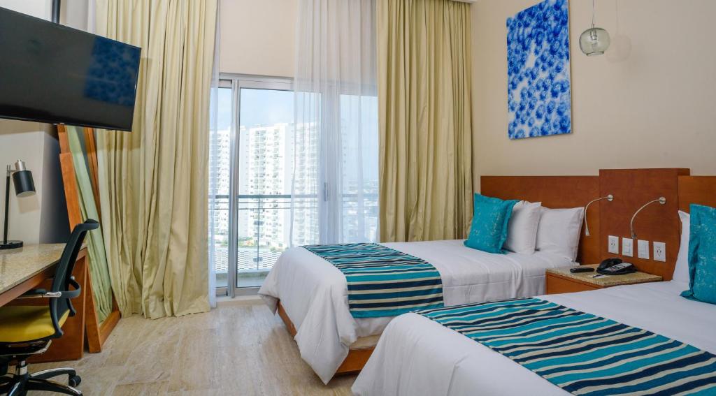 Двухместный (Номер Altitude с завтраком, посещение пляжного клуба) отеля Krystal Urban Cancun Centro, Канкун