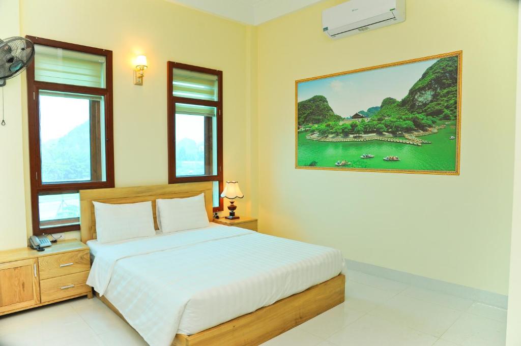 Двухместный (Улучшенный двухместный номер с 1 кроватью) семейного отеля Hoang Giang Homestay, Ниньбинь