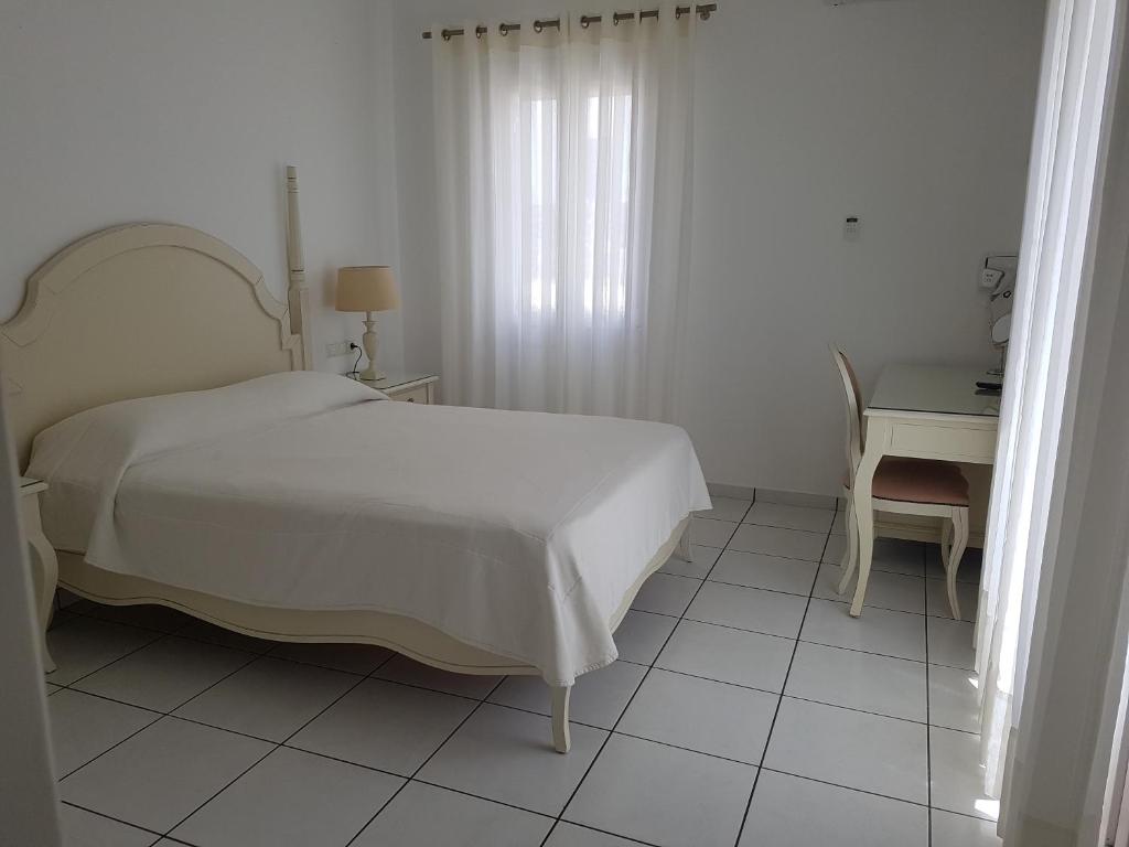 Двухместный (Стандартный двухместный номер с 1 кроватью или 2 отдельными кроватями) отеля Hotel Alkyon, Миконос
