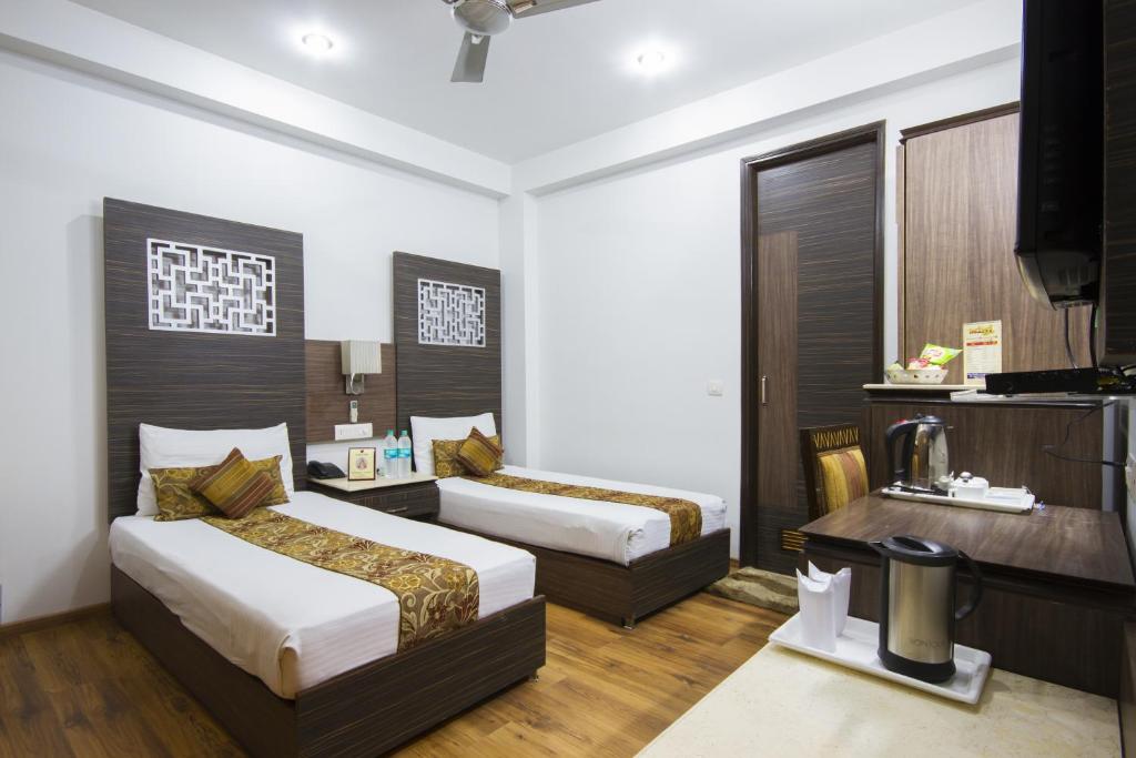 Двухместный (Двухместный номер с 1 кроватью или 2 отдельными кроватями) отеля FabHotel Sunstar Karol Bagh, Нью-Дели