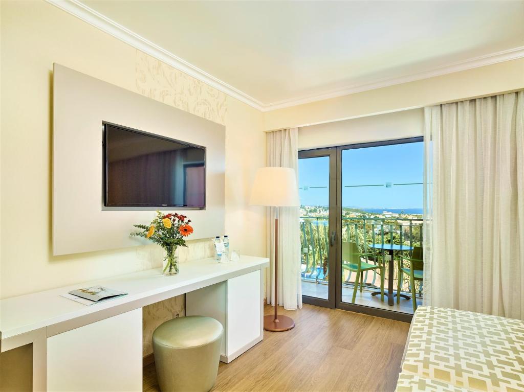 Двухместный (Двухместный номер Делюкс с 2 отдельными кроватями и видом на море) отеля Hotel Baia Grande, Албуфейра