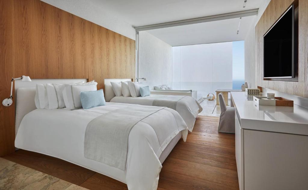 Двухместный (Номер Viceroy с 2 двуспальными кроватями, вид на океан) курортного отеля Viceroy Los Cabos, Сан-Хосе-дель-Кабо
