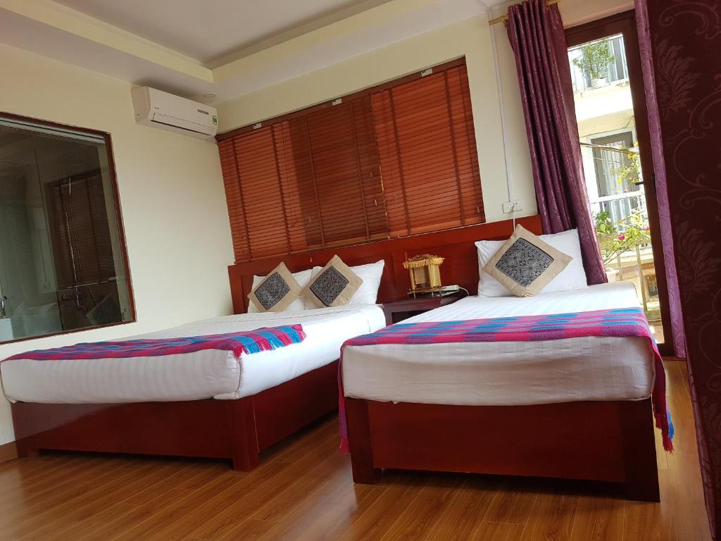 Двухместный (Улучшенный двухместный номер с 2 отдельными кроватями) отеля Botanic Sapa Hotel, Сапа