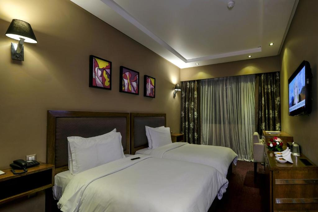 Двухместный (Двухместный номер Делюкс с 2 отдельными кроватями) отеля Belere Hotel Rabat, Рабат