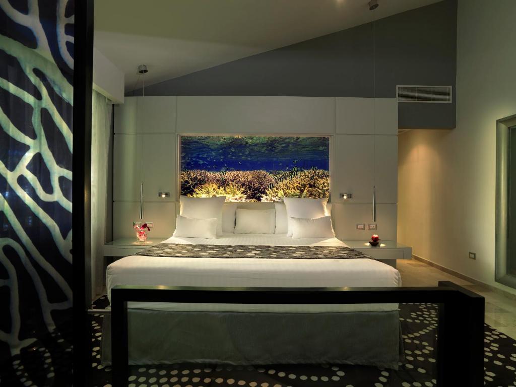 Сьюит (Люкс с видом на океан и королевским сервисом) курортного отеля Paradisus Punta Cana Resort, Пунта-Кана