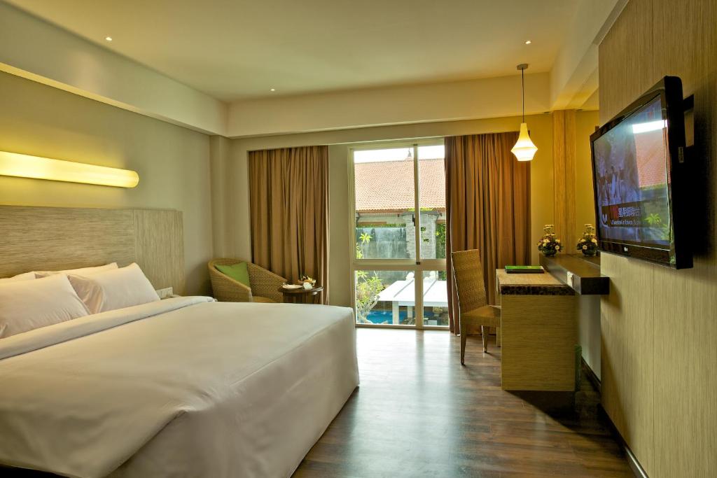 Двухместный (Номер Делюкс с дополнительной кроватью) отеля Bintang Kuta Hotel, Кута