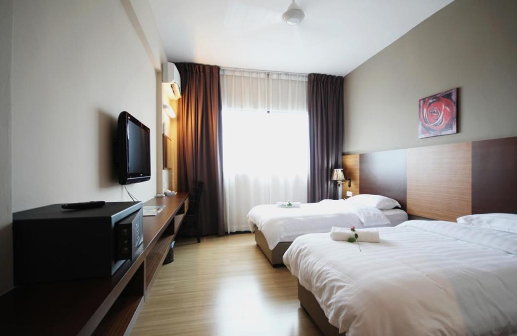 Двухместный (Двухместный номер «Премьер Делюкс с 2 отдельными кроватями) отеля Aroma Hotel, Пенанг