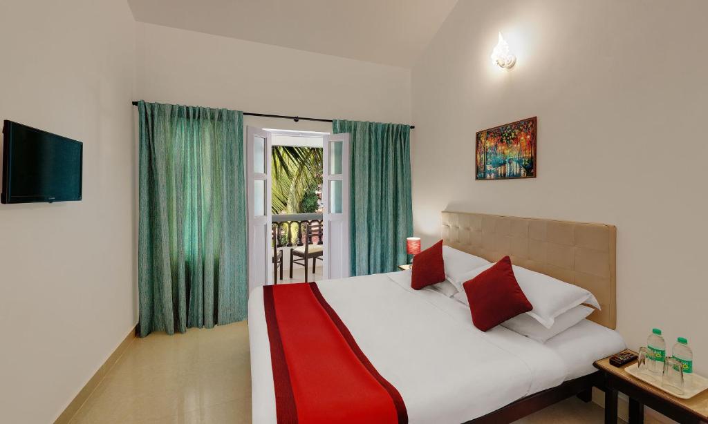 Двухместный (Двухместный номер Делюкс с 1 кроватью) курортного отеля OYO 10169 Santiago Beach Resort 2, Калангут