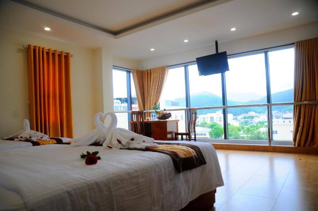 Двухместный (Двухместный номер Делюкс с 1 кроватью или 2 отдельными кроватями, вид на город) отеля Green Hotel Quy Nhơn, Куинён