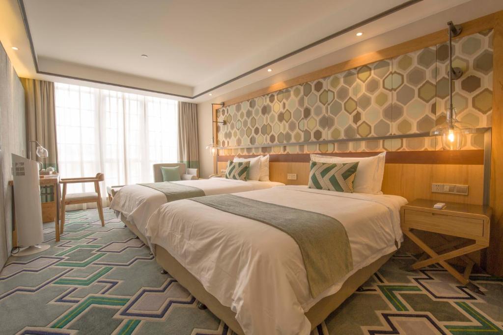 Двухместный (Улучшенный двухместный номер Делюкс с 2 отдельными кроватями) отеля Cosy Park Hotel, Ханчжоу