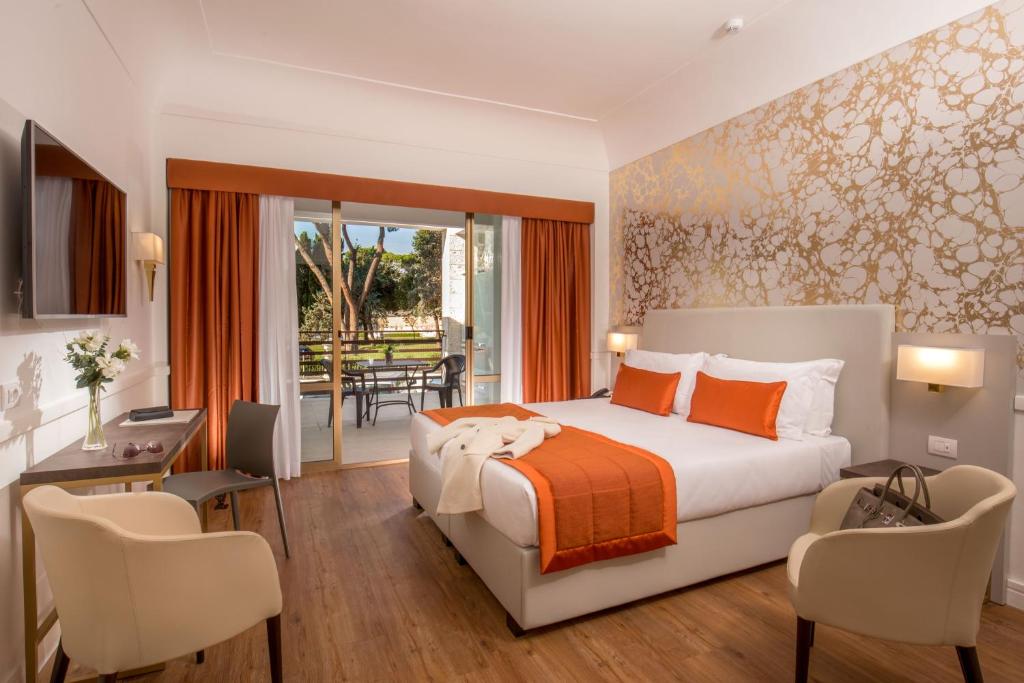 Двухместный (Улучшенный двухместный номер с 1 кроватью) отеля Hotel Shangri-La Roma, Рим