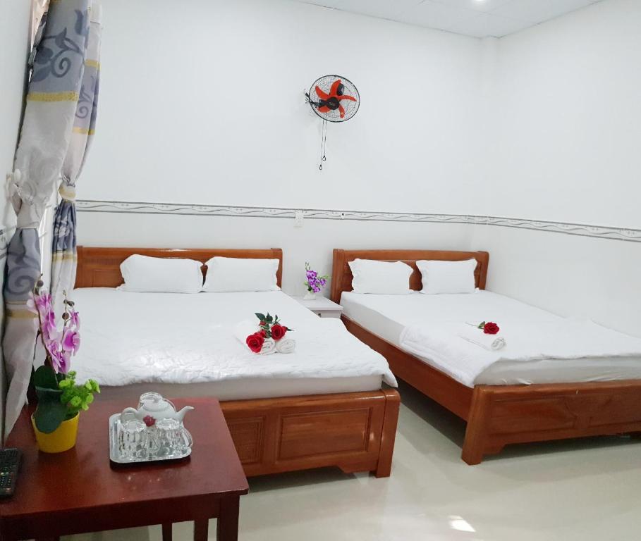 Четырехместный (Четырехместный номер) гостевого дома Hai Phuong Tuyen Guesthouse, Дуонг-Донг