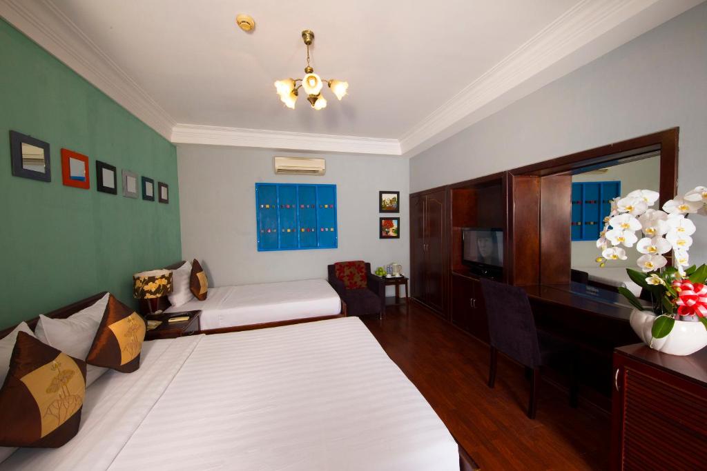 Трехместный (Улучшенный трехместный номер) отеля Shangri La saigon hotel, Хошимин