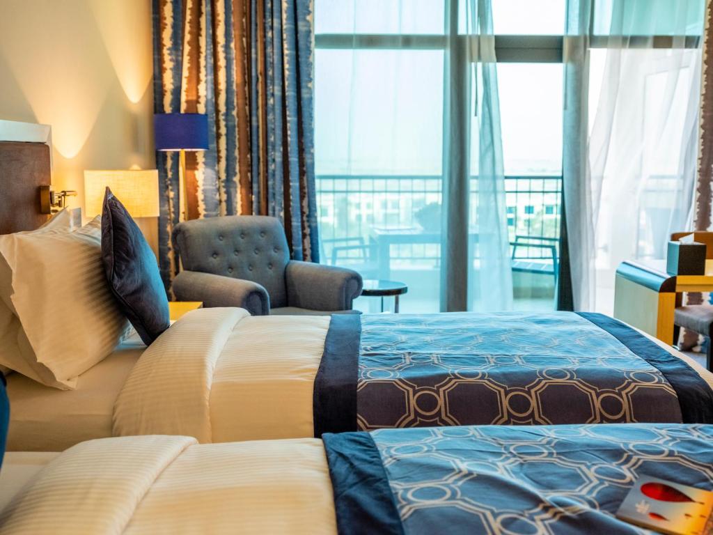 Двухместный (Номер «Престиж» с видом на бассейн) курортного отеля Vichy Célestins Spa Resort – Retaj Salwa, Доха